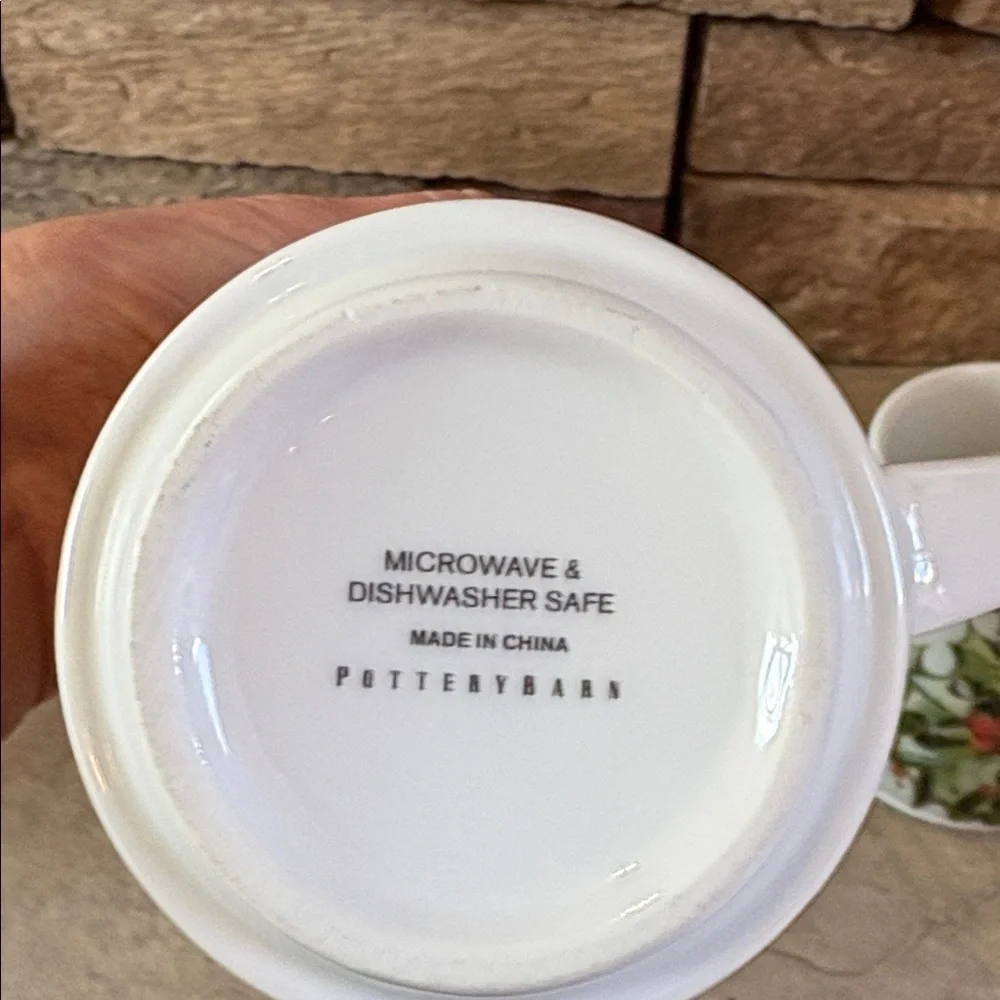 Pottery Barn ceramic holiday mugs with Holly and poinsettias